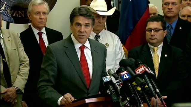 PHOTO: Texas Gov. Rick Perry, seen here at a press conference on April 4, 2013, vowed to hunt down and punish those responsible for killing two Dallas-area prosecutors, and doubled a reward to $200,000 for information that leads to a conviction.