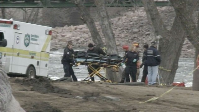 PHOTO: A body is recovered from a river in Sioux Falls, South Dakota, where a teenage girl and a man are missing after jumping into the icy waters to save a six-year-old boy on March 14, 2013.