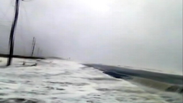 VIDEO: Storm surge in Rodanthe, N.c., floods roadway and homes.