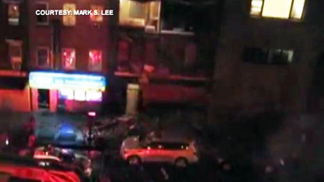 VIDEO: The exterior of a building collapses during Hurricane Sandy's heavy rains and wind.