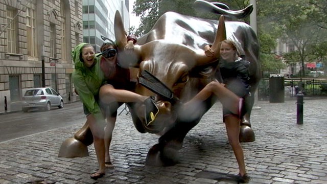 PHOTO: Alex Libby, Hannah Gabelmann and Janna Libby decided to survey the extent of Hurricane Irene?s fury by walking through lower Manhattan in scuba gear.