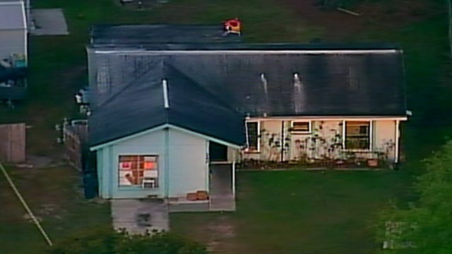 PHOTO: A Florida man is trapped under debris after a sinkhole opened in his home, in Brandon, Fla.