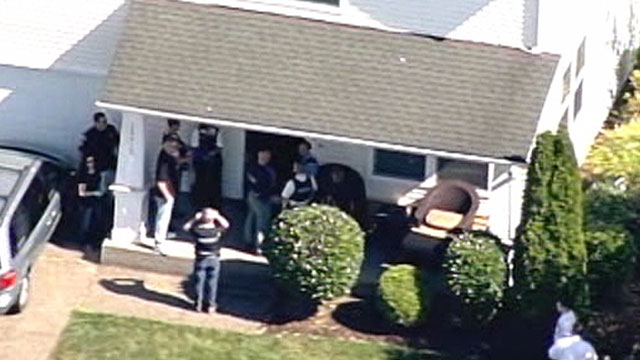 PHOTO: Josh Powell and his father, Steve Powell, are being detained while investigators executed a search warrant.