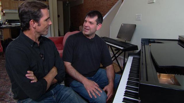 PHOTO: With the help of Music Corp, Veteran Todd Love learned to play the piano after losing both legs and his left arm in Afghanistan.