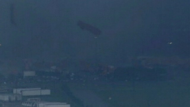 VIDEO: Powerful twisters toss large trucks through the air.
