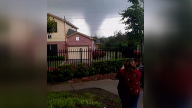 VIDEO: Brandy Kemps shouts at a friend as sirens warn of approaching tornado.