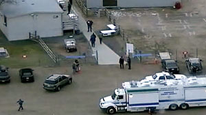 PHOTO The owner of a shooting range where 29-year-old twin sisters from Australia were shot and one of them was killed said it appeared from surveillance video that the two women were shot at the same time.
