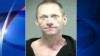 VIDEO: Oregon police arrest Mark Eskelson after he called 911 to request a hug.