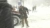 VIDEO: A police officer is on desk duty after pulling a gun to stop a snowball fight.
