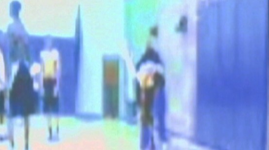 Video: Basketball coach caught on tape whipping players.