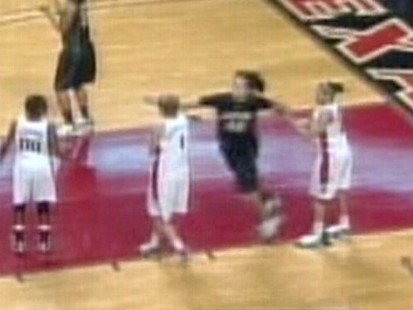 VIDEO: Baylor freshman Brittney Griner throws a punch at a Texas tech opponent.