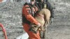 VIDEO: A New York dog runs back into icy waters after being rescued a first time.