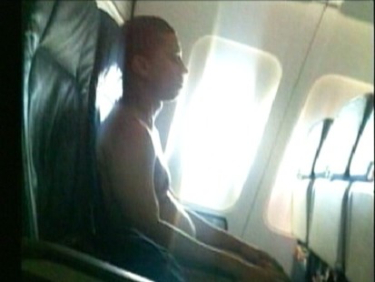 VIDEO: A flight is diverted after a naked man refuses to cover up.