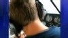 VIDEO: A passenger screams after the pilot pretends to faint while flying his plane.