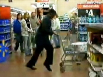 VIDEO: A Walmart customer performs the moonwalk in store aisles.