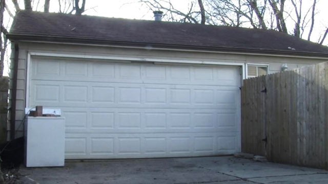 PHOTO: An Iowa woman was charged with animal torture after she hung her boyfriends dog by its leash in his garage.