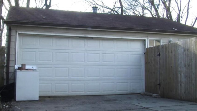 PHOTO: An Iowa woman was charged with animal torture after she hung her boyfriends dog by its leash in his garage.