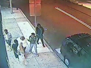 Teen Girls Laugh During Beating of Woman