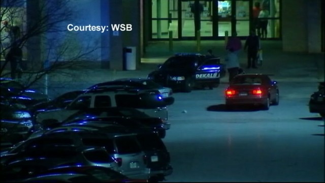 VIDEO: Holiday shoppers startled after gun shots go off in mall parking lot.