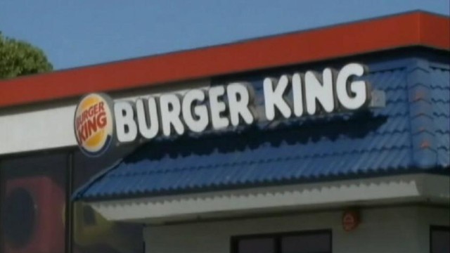 VIDEO: A quick-thinking worker at a California Burger King prevented robbery suspects escape by car.