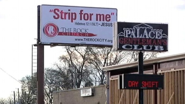VIDEO: Sign above a gentlemans club paraphrases Biblical verse, encourages patrons to re-focus on family.