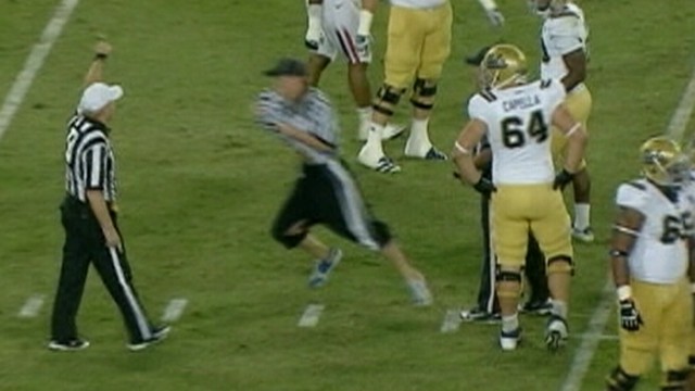 VIDEO: UCLA, Arizona football game was interrupted by a male streaker and player brawl.