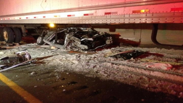 VIDEO: The couple in Kentucky suffered non-life-threatening injuries when their car was crushed by a tractor-trailer.