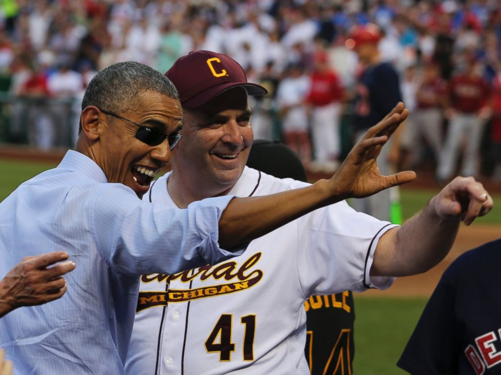 PHOTO: President Barack Obama waves with Representative Dan Kildee, D-Mich (R) during a visit of the 2015 Congressional Baseball Game at the National Parks Stadium, in Washington, D.C., June 11, 2015.