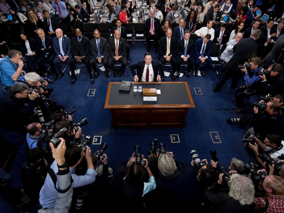 PHOTO: Former FBI Director James Comey takes his seat to testify at a Senate Intelligence Committee hearing on Capitol Hill, June 8, 2017, in Washington, D.C.