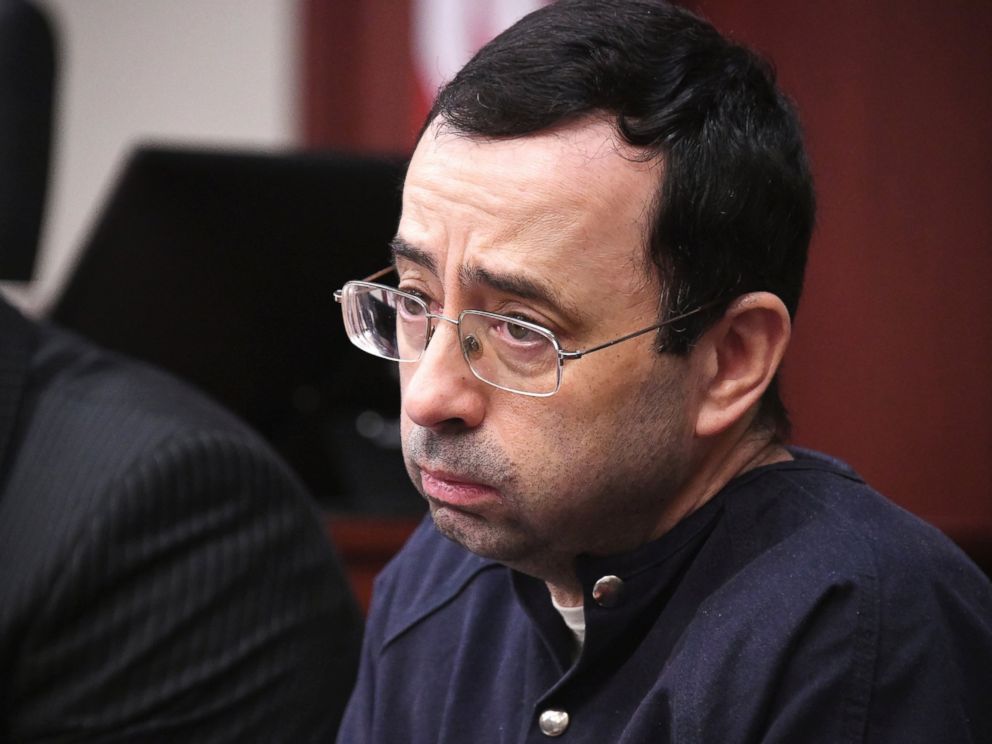 Larry Nassar looks at the gallery in the court during the sixth day of his sentencing hearing Tuesday, Jan. 23, 2018, in Lansing, Mich. Nassar has admitted sexually assaulting athletes when he was employed by Michigan State University and USA Gymnastics.