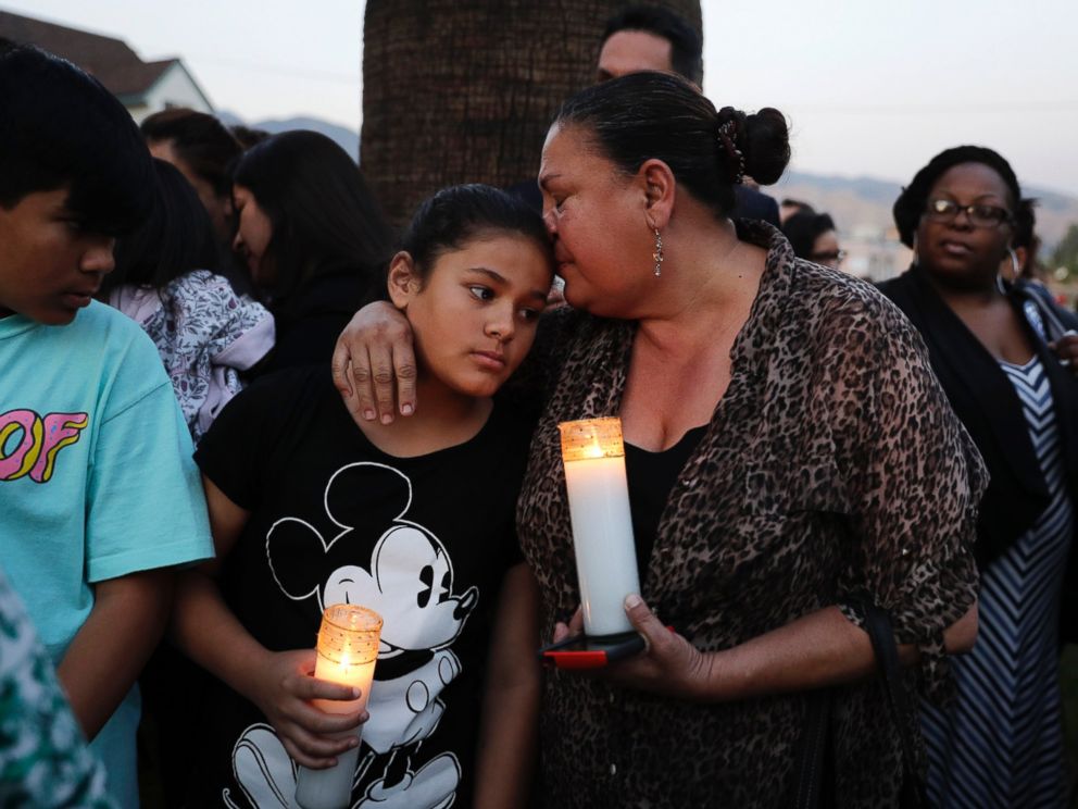 PHOTO: Betty Rodriguez, right, comforts her granddaughter Giselle during a prayer service held to honor the shooting victims at North Park Elementary School, April 10, 2017, in San Bernardino, Calif.