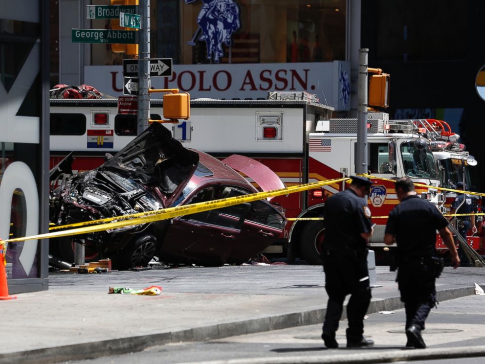 PHOTO: A smashed car sits on the corner of Broadway and 45th Street in New Yorks Times Square after ploughing through a crowd of pedestrians, May 18, 2017.