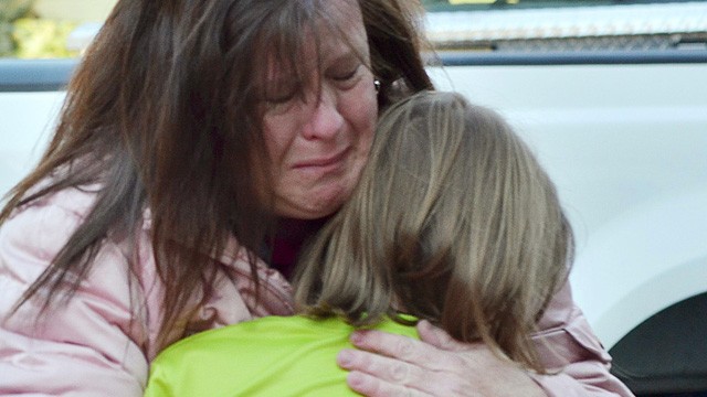 PHOTO: A mother hugs her daughter following a shooting at the Sandy Hook Elementary School in Newtown, Conn., about 60 miles northeast of New York City on Dec. 14, 2012.