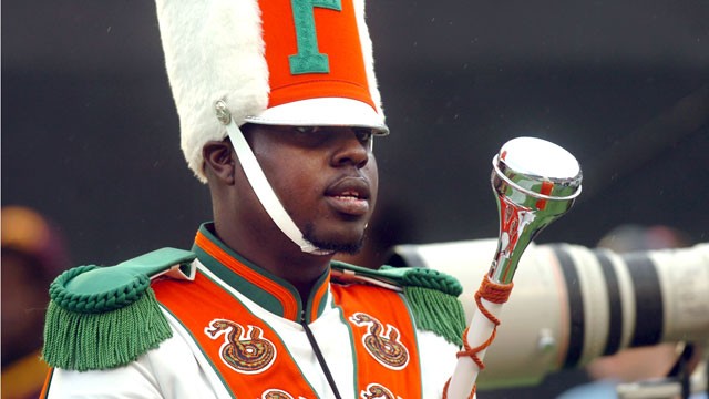 PHOTO: Robert Champion, a drum major in Florida A&M University's Marching 100 band, performs during halftime of a football game in Orlando, Fla, Nov. 19 2011.