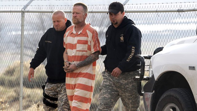 PHOTO: Sanpete Sheriffs Officers escort Troy James Knapp, 45, to the Sanpete County Jail, April 2, 2013, in Manti, Utah.