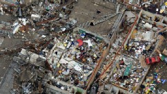 PHOTO: An aerial view shows Briarwood Elementary School with vehicles thrown about after Monday's tornado, May 21, 2013, in Moore, Okla.