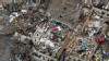 An aerial view shows Briarwood Elementary School with vehicles thrown about after Monday's tornado, May 21, 2013, in Moore, Okla.