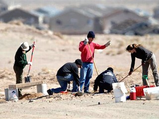 PHOTO Authorities believe the 10 bodies found there this month were buried by one person. Albuquerque