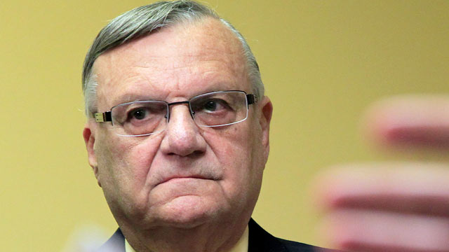PHOTO: Maricopa County Sheriff Joe Arpaio listens to one of his attorneys during a news conference, April 3, 2012, in Phoenix.