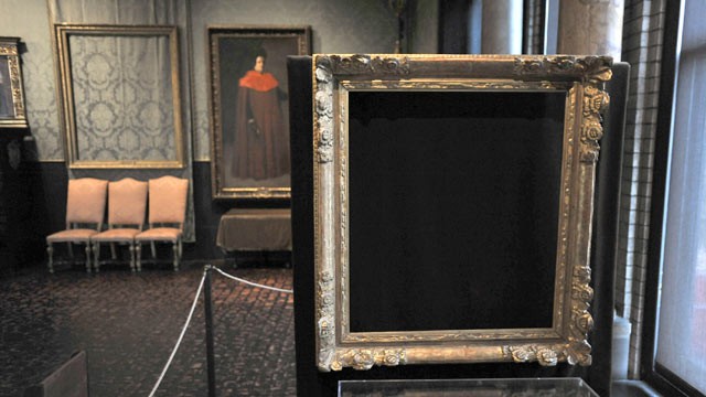 PHOTO: Empty frames from which thieves took "Storm on the Sea of Galilee," left background, by Rembrandt and "The Concert," right foreground, by Vermeer, remain on display at the Isabella Stewart Gardner Museum in Boston, March 11, 2010.