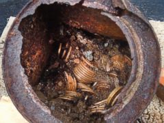 PHOTO: A image provided by the Saddle Ridge Hoard shows one of six decaying metal canisters filled with 1800s-era U.S. gold coins unearthed in California by two people who want to remain anonymous. The value of the treasure is estimated at $10 million.