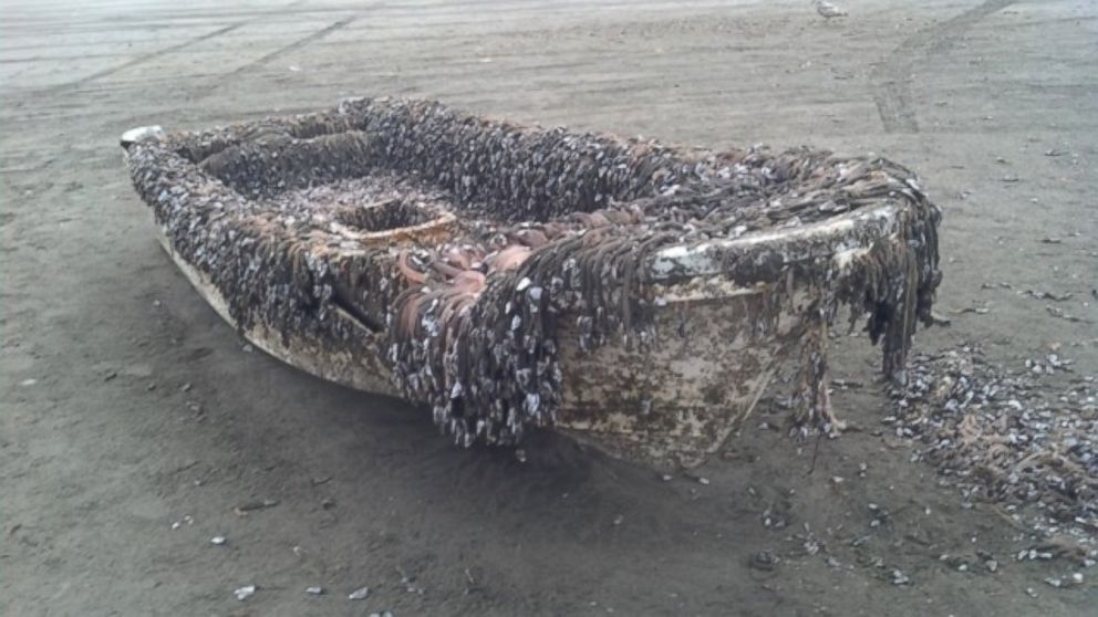 PHOTO: This photo provided by Ocean Shores Police Department, a small boat is washed on the beach at Ocean Shores, Wash., on April 28, 2014.