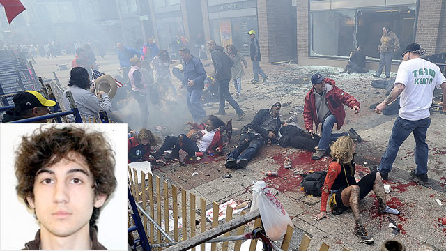 PHOTO: Injured people and debris lie on the sidewalk near the Boston Marathon finish line following an explosion in Boston, Monday, April 15, 2013.