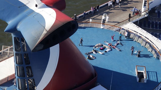 PHOTO: Passengers spell out the word