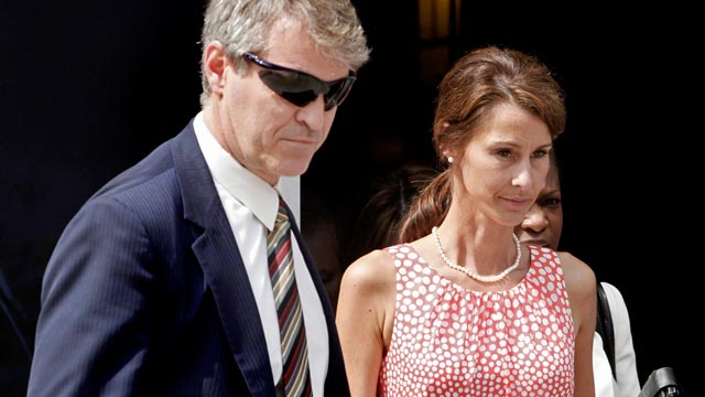 PHOTO: Cheri Young, right, is escorted out of the Federal Courthouse in Greensboro, N.C. on April 30, 2012, after testifying in the John Edwards trial.