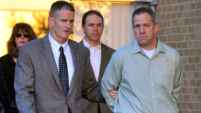 PHOTO: JetBlue pilot Clayton Frederick Osbon, right, is escorted to a waiting vehicle by FBI agents as he is released from The Pavilion at Northwest Texas Hospital.