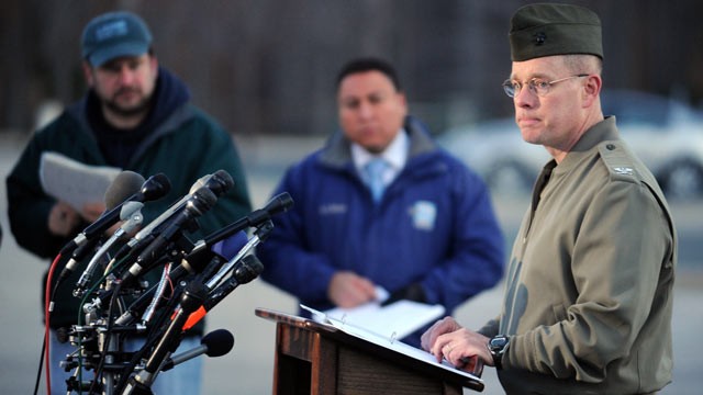 PHOTO: Col. David W. Maxwell holds a press conference at the Marine Corps Museum in Quantico, Va., March 22, 2013 regarding a murder/suicide that occurred and resulted in the deaths of three Marines.