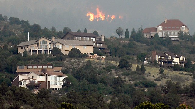 PHOTO: A wildfire burns near Colorado Springs, Colo., June 24, 2012. The fire erupted and grew out of control to more than 3 square miles.