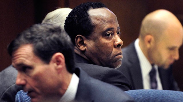 PHOTO: Dr. Conrad Murray sits with his attorneys as he listens to testimony by Dr. Robert Waldman, an addiction specialist, during Murray's involuntary manslaughter trial in Los Angeles, Oct. 27, 2011.
