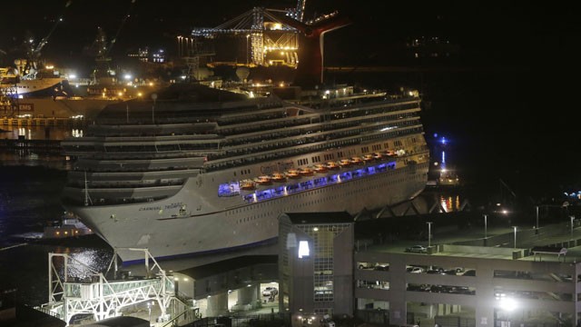 PHOTO: The cruise ship Carnival Triumph is pushed towards the cruise terminal along the Mobile River in Mobile, Ala., Thursday, Feb. 14, 2013.